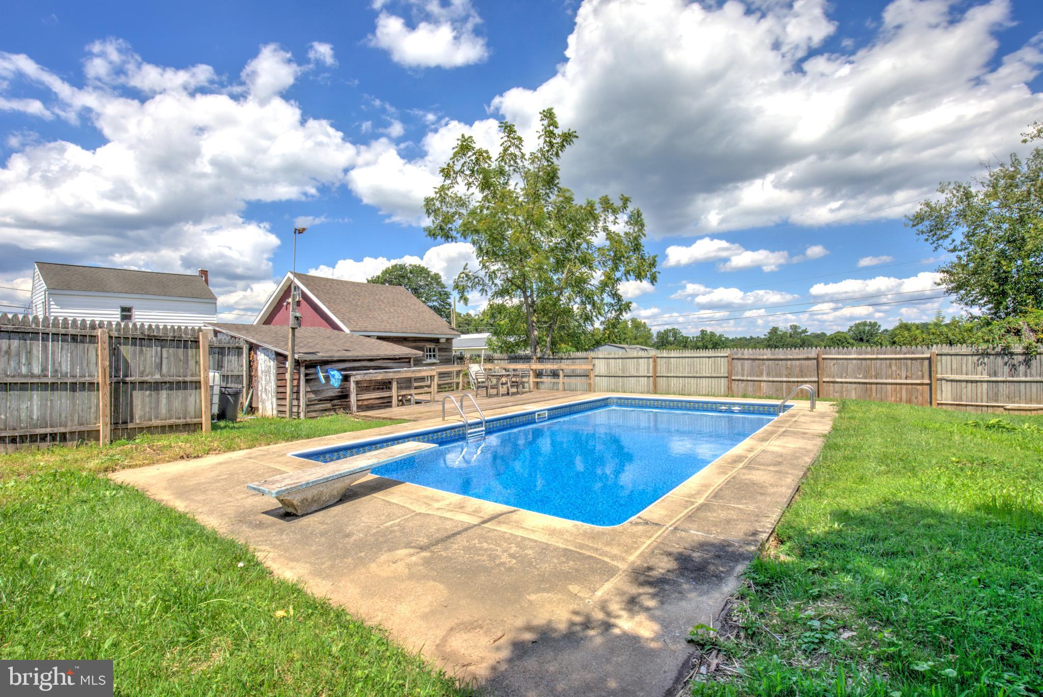 204 Roneys Corner Road Oxford, PA 19363 - Photo 32 of 33 a view of a house with swimming pool and sitting area