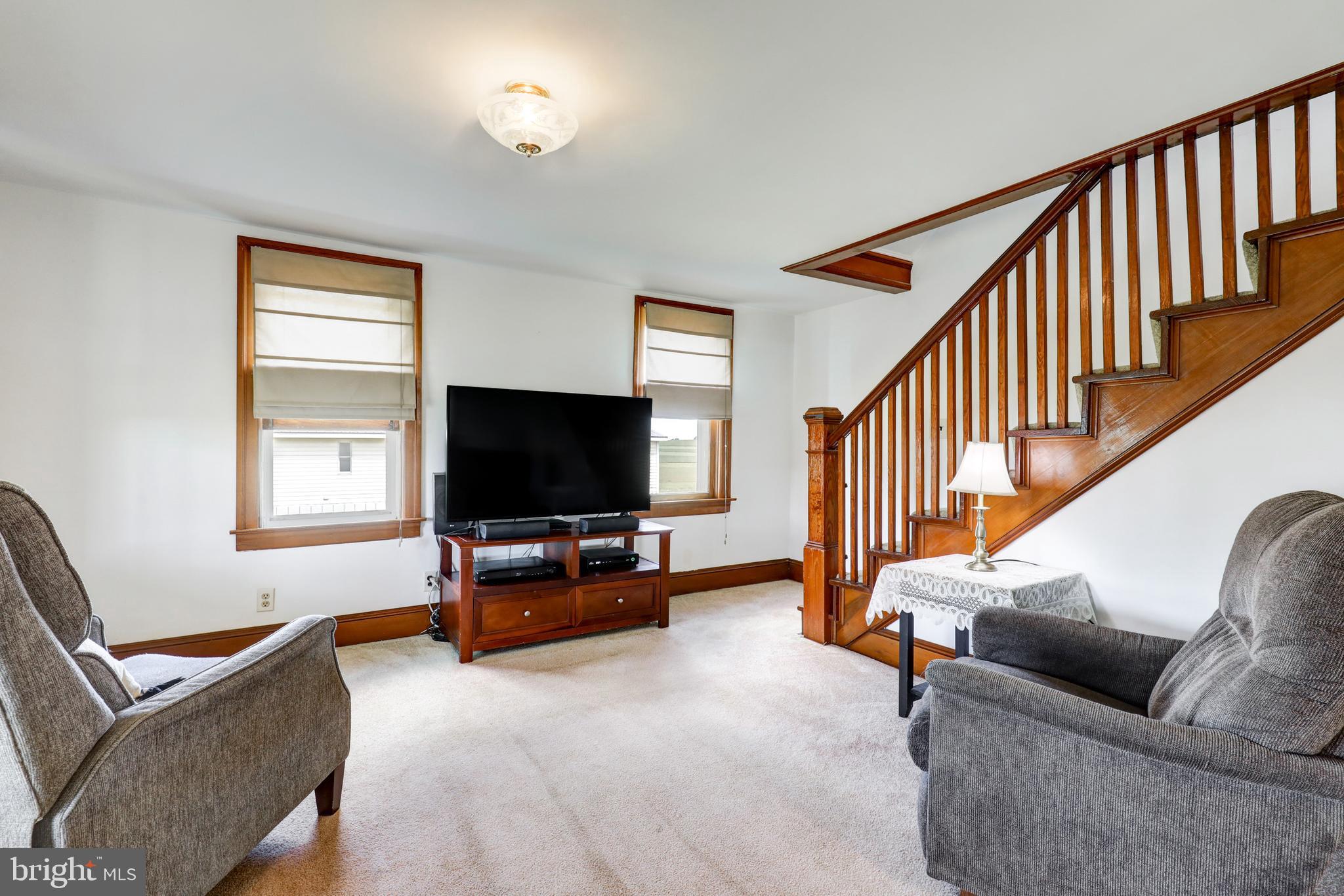 204 Roneys Corner Road Oxford, PA 19363 - Photo 5 of 33 a living room with furniture and a flat screen tv