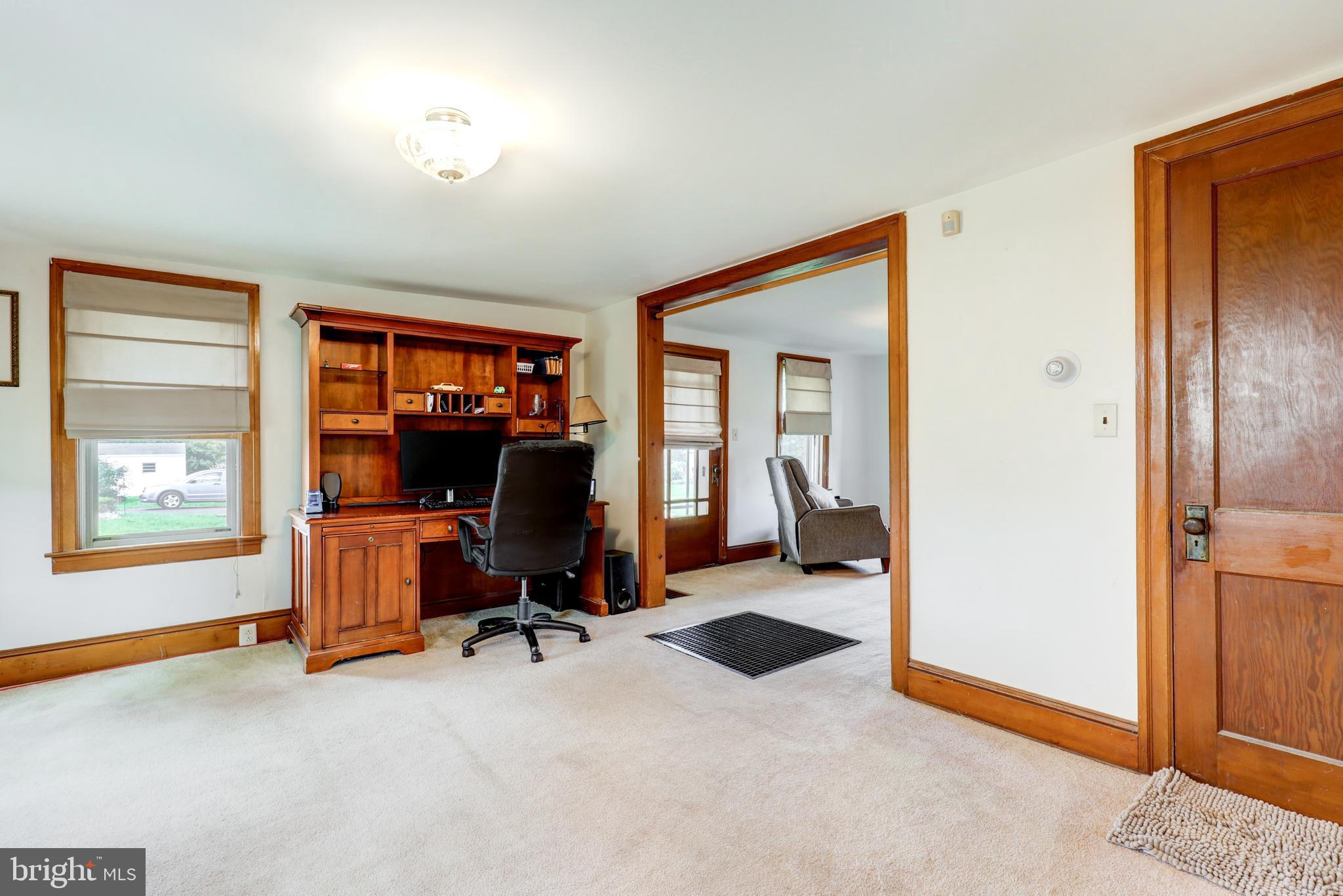 204 Roneys Corner Road Oxford, PA 19363 - Photo 8 of 33 a view of a livingroom with workspace and a window