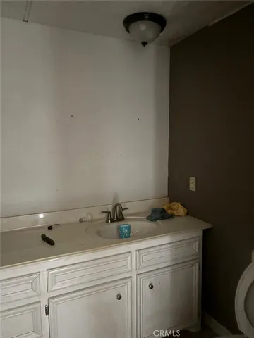 a room with cabinets and a window