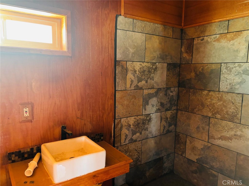 11690 Camp Rock Road Lucerne Valley, CA 92356 - Photo 5 of 33 a bathroom with a sink and shower