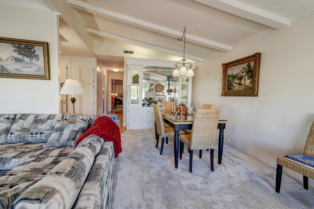 1010 Palm Canyon Drive, Unit 339 Borrego Springs, CA 92004 - Photo 13 of 19 a view of a dining room with furniture and chandelier