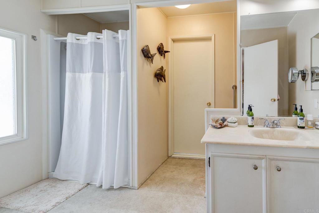 1010 Palm Canyon Drive, Unit 339 Borrego Springs, CA 92004 - Photo 16 of 19 a bathroom with a sink and mirror