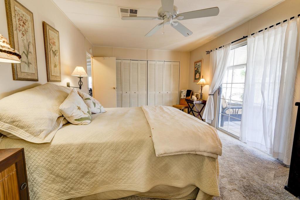 1010 Palm Canyon Drive, Unit 339 Borrego Springs, CA 92004 - Photo 6 of 19 a bedroom with a bed and wooden floor