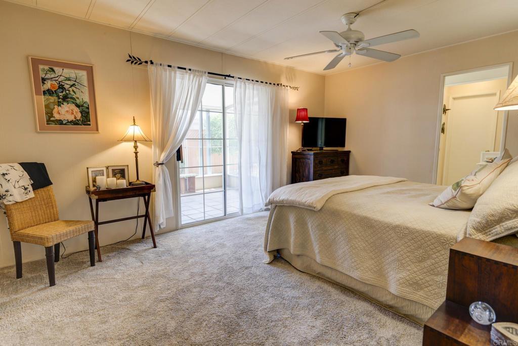 1010 Palm Canyon Drive, Unit 339 Borrego Springs, CA 92004 - Photo 10 of 19 a bedroom with a bed and a chair