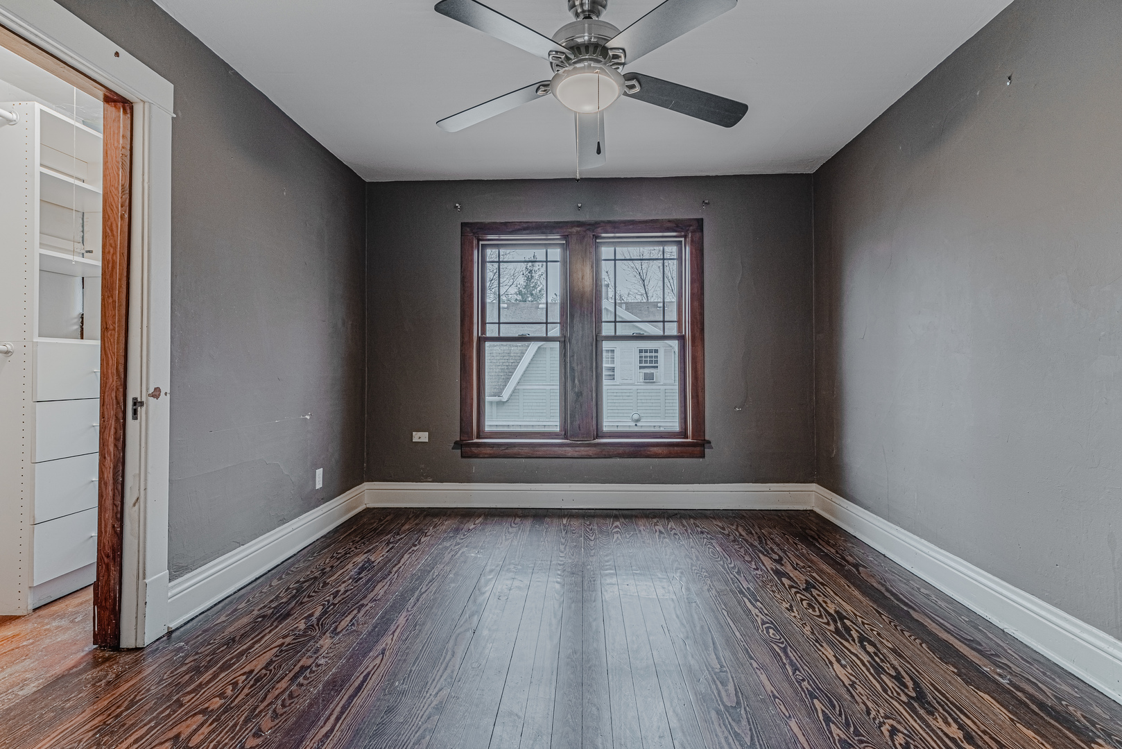 1507 Riverside Drive McHenry, IL 60050 - Photo 18 of 27 wooden floor in an empty room with a window