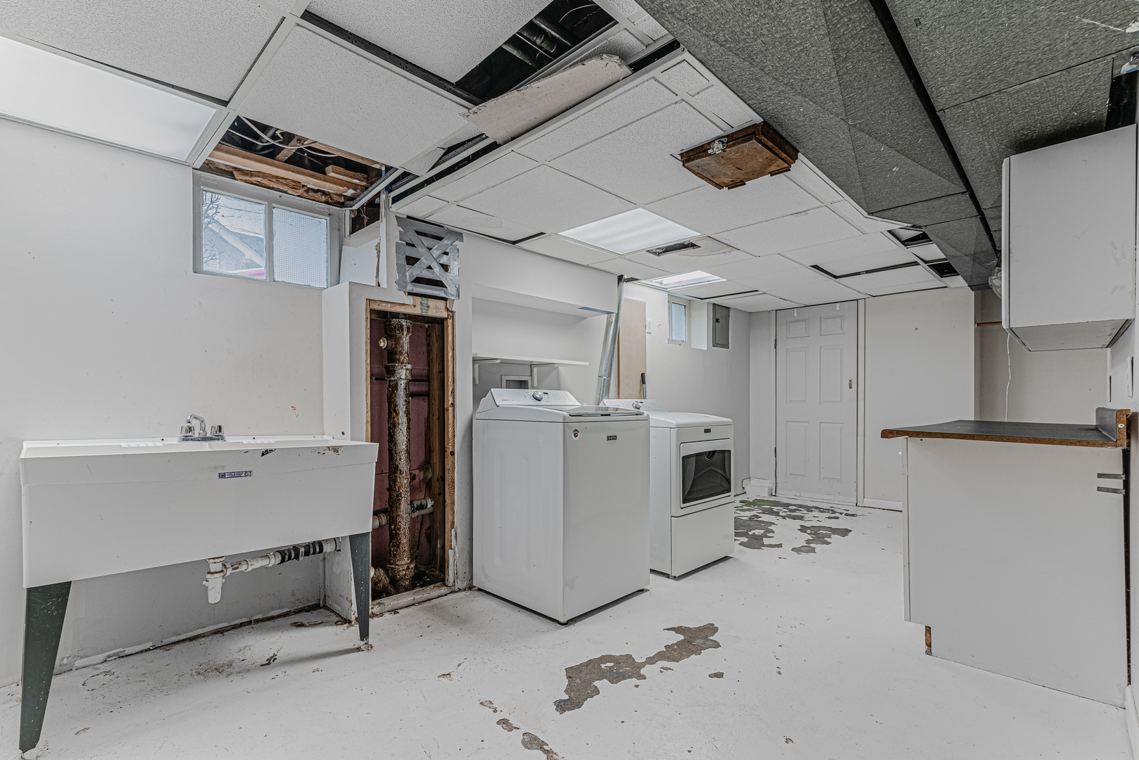 1507 Riverside Drive McHenry, IL 60050 - Photo 24 of 27 a view of storage and utility room with refrigerator