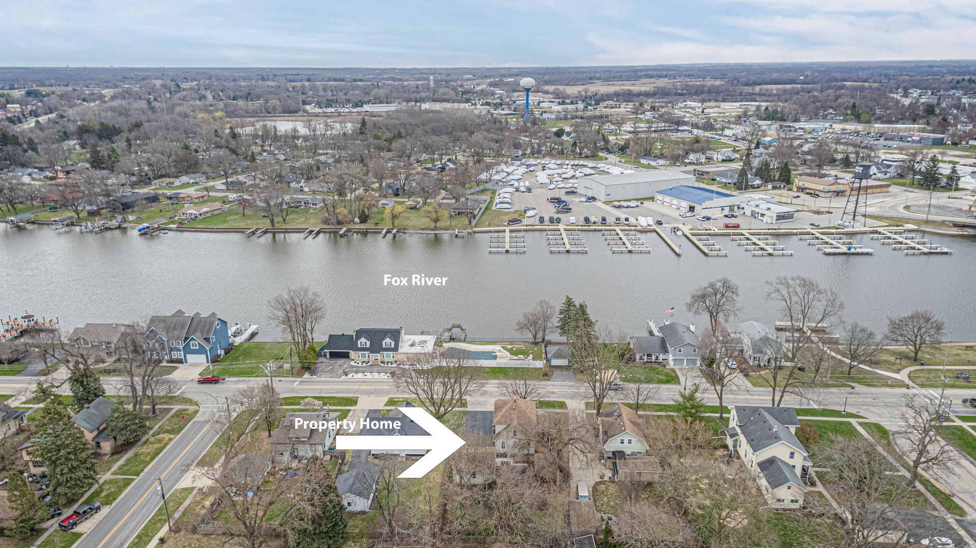 1507 Riverside Drive McHenry, IL 60050 - Photo 5 of 27 a view of a lake with a city