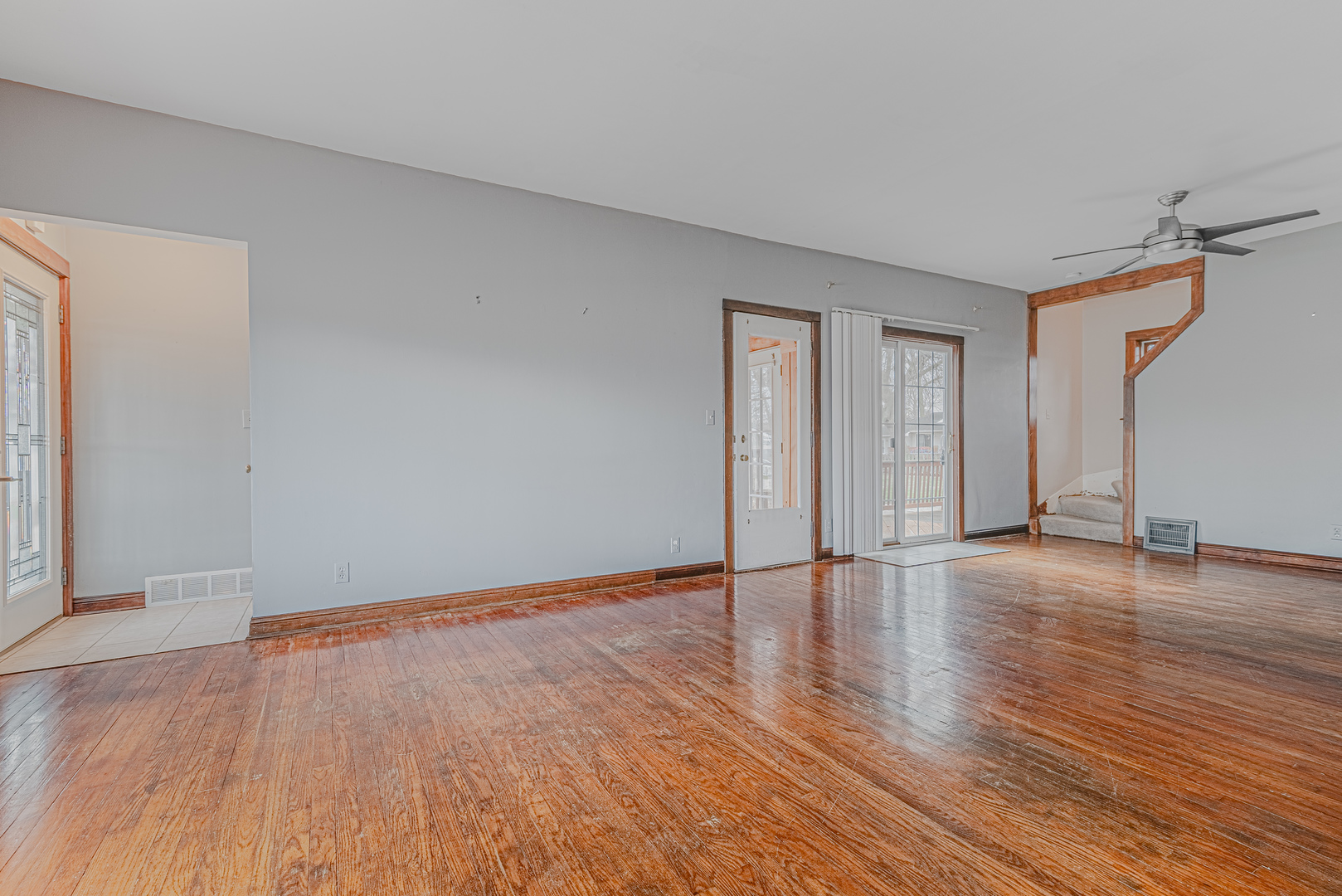 1507 Riverside Drive McHenry, IL 60050 - Photo 9 of 27 a view of an empty room with wooden floor and a window