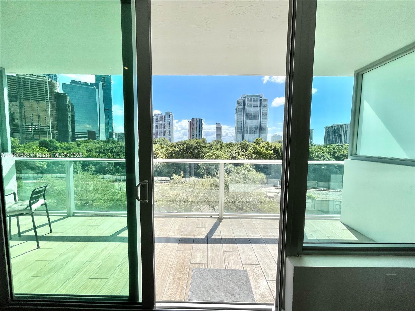 1600 Southwest 1st Avenue, Unit 511 Miami, FL 33129 - Photo 8 of 10 a view of a city from a living room