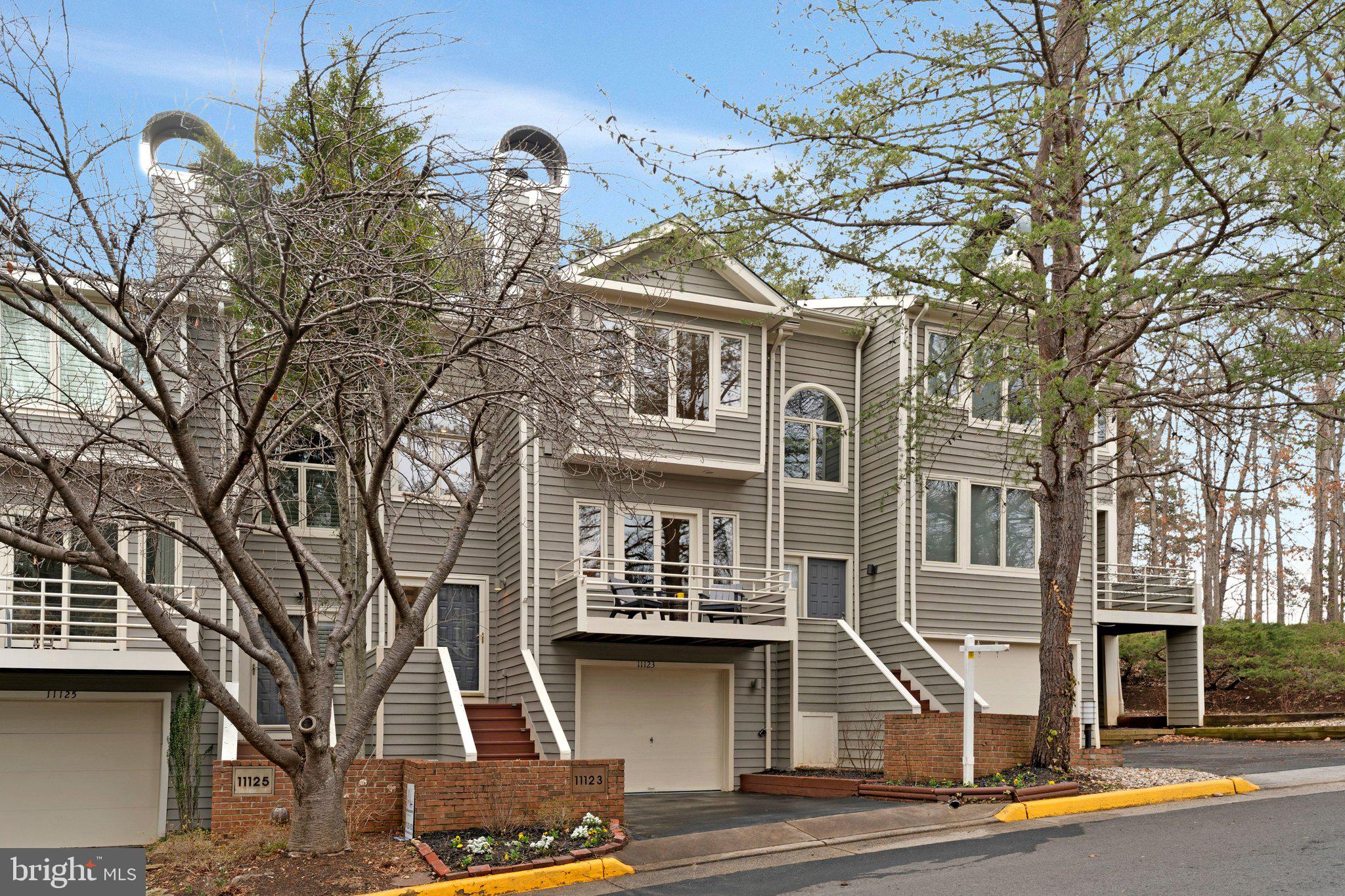 11123 Lakespray Way Reston, VA 20191 - Photo 1 of 47 a front view of a house
