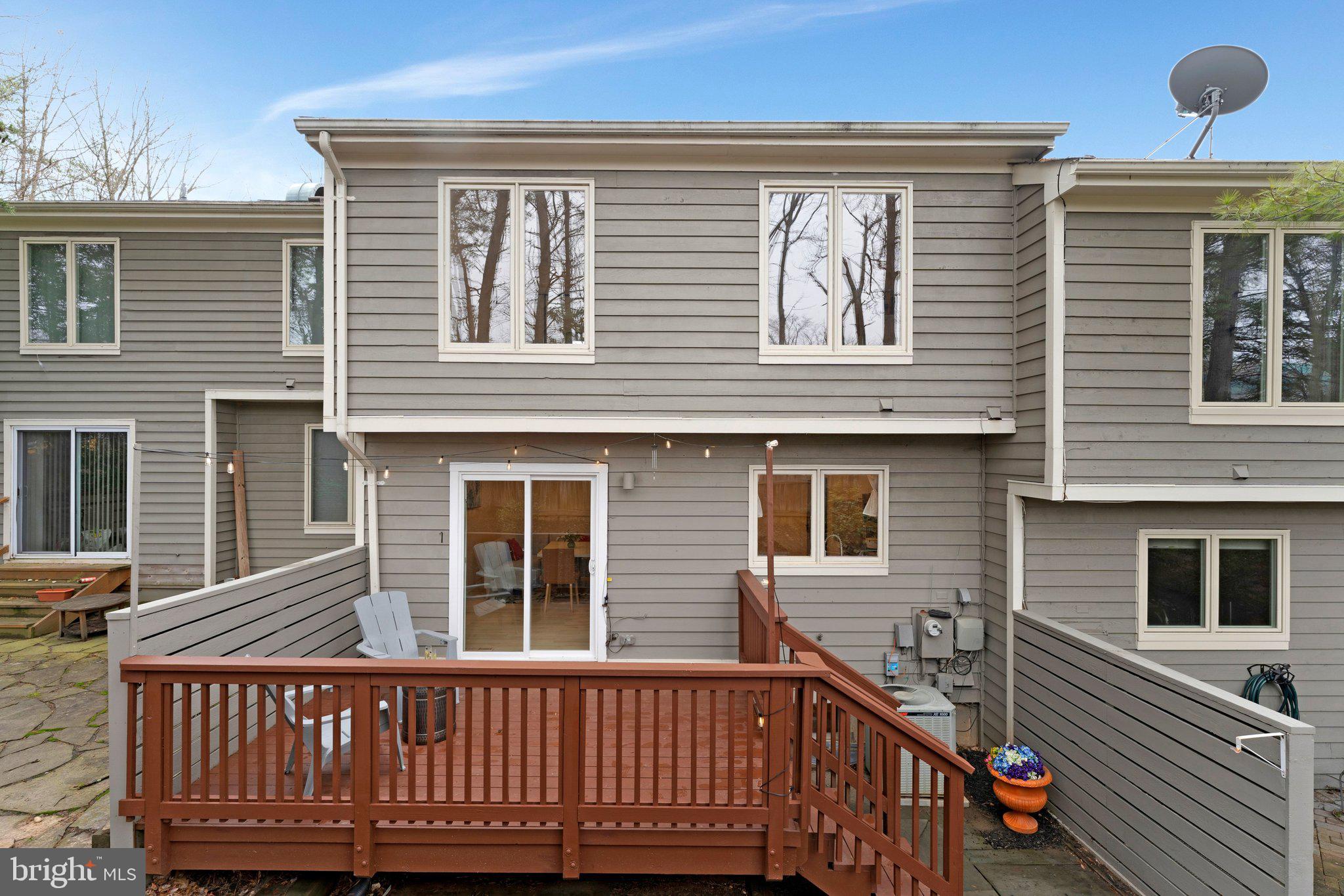 11123 Lakespray Way Reston, VA 20191 - Photo 18 of 47 a view of a brick house with a large window