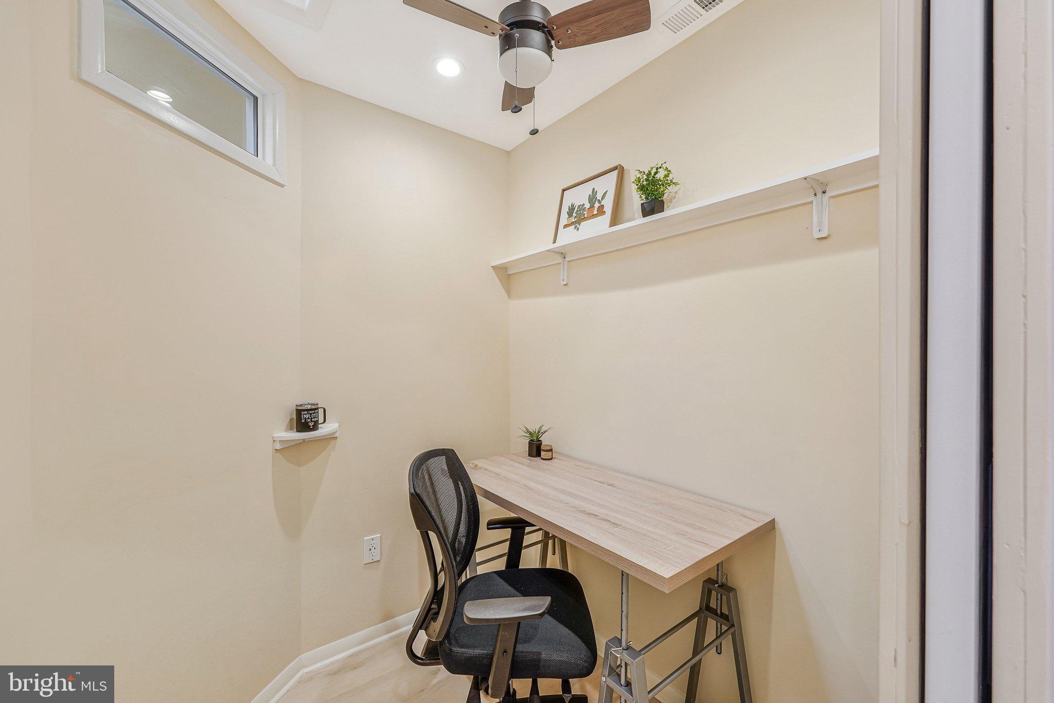11123 Lakespray Way Reston, VA 20191 - Photo 34 of 47 a view of a hallway with workspace and wooden floor