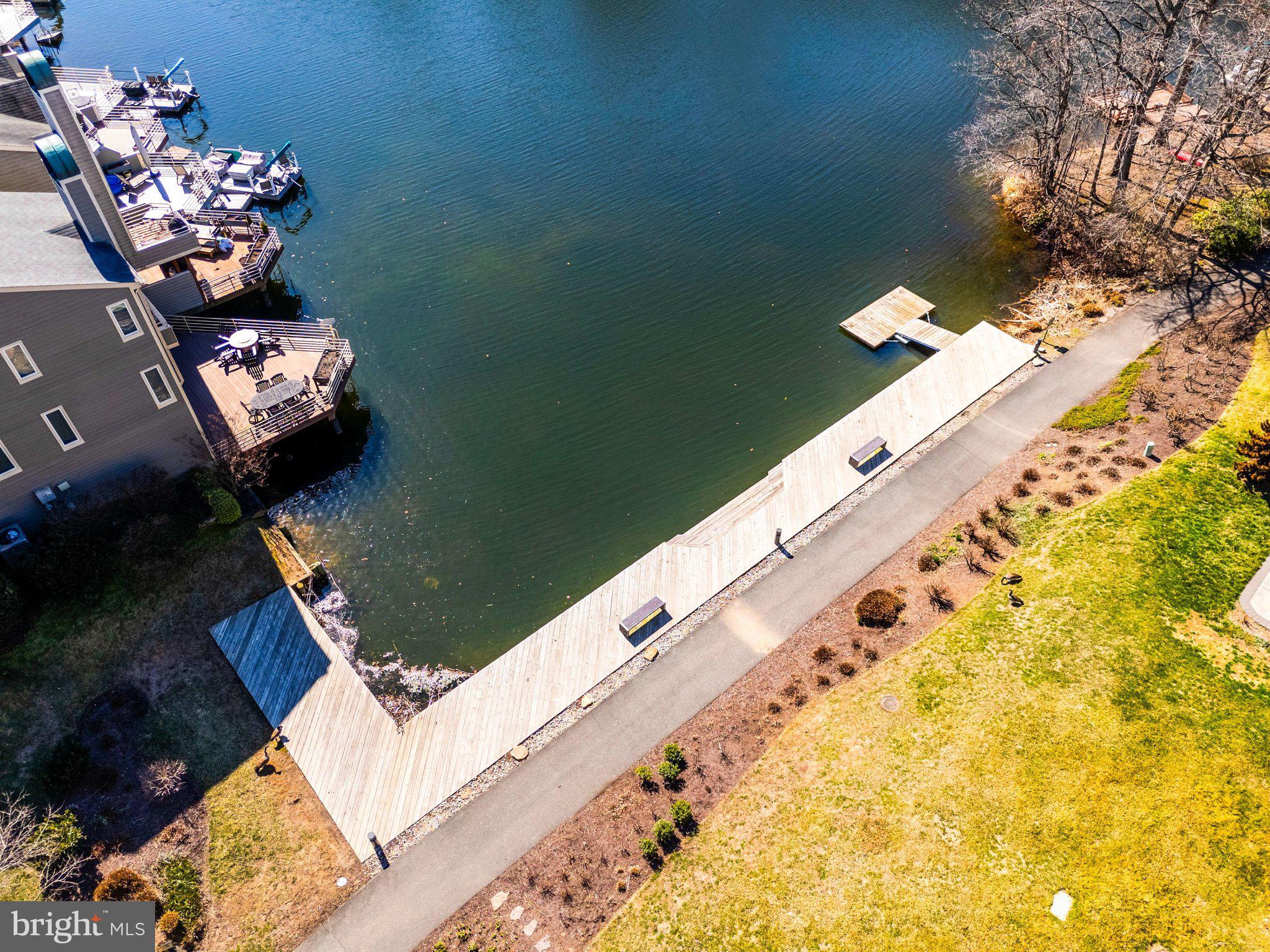11123 Lakespray Way Reston, VA 20191 - Photo 43 of 47 view of a swimming pool with a bench