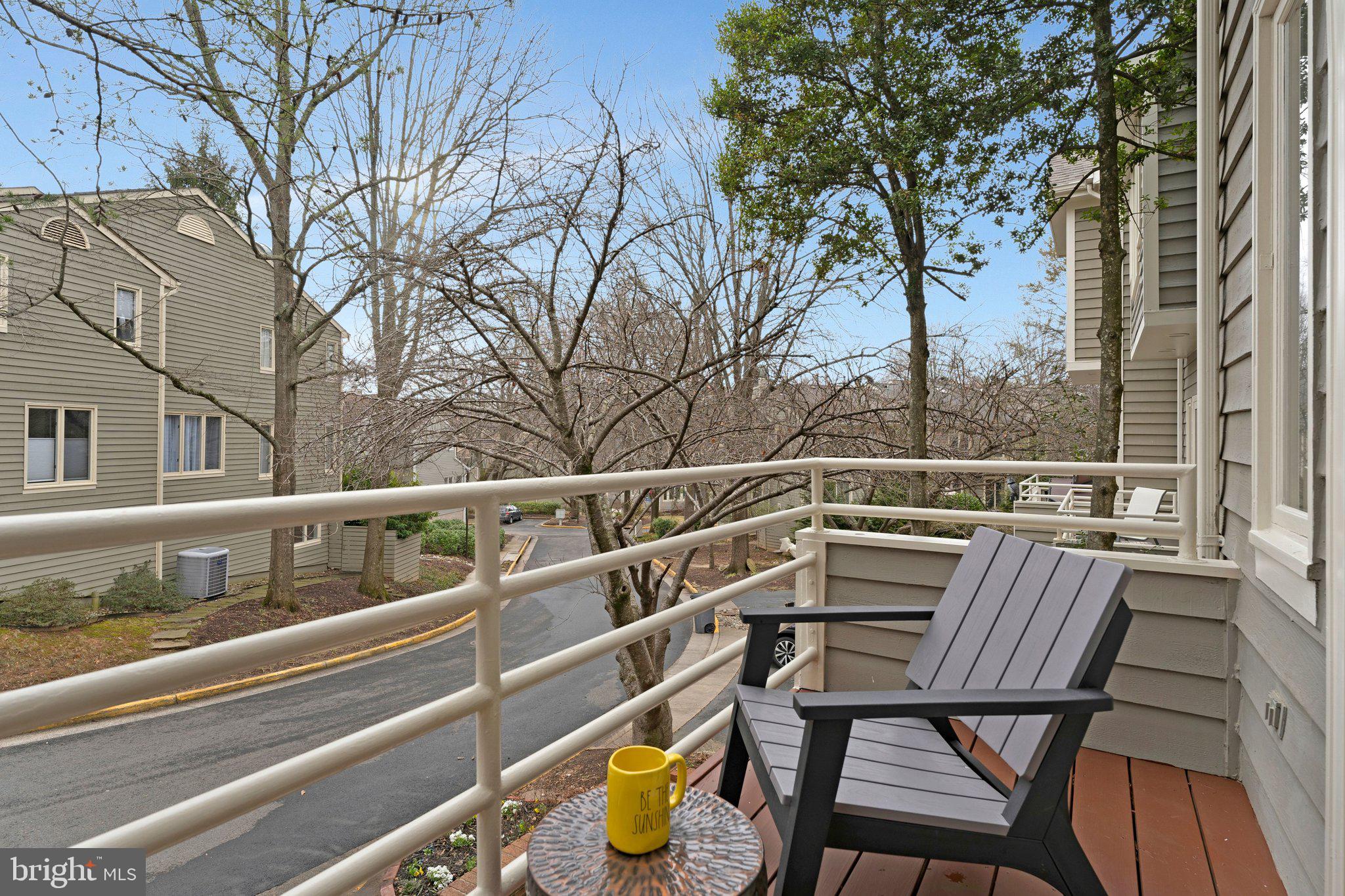 11123 Lakespray Way Reston, VA 20191 - Photo 9 of 47 a view of a chairs and table on the balcony