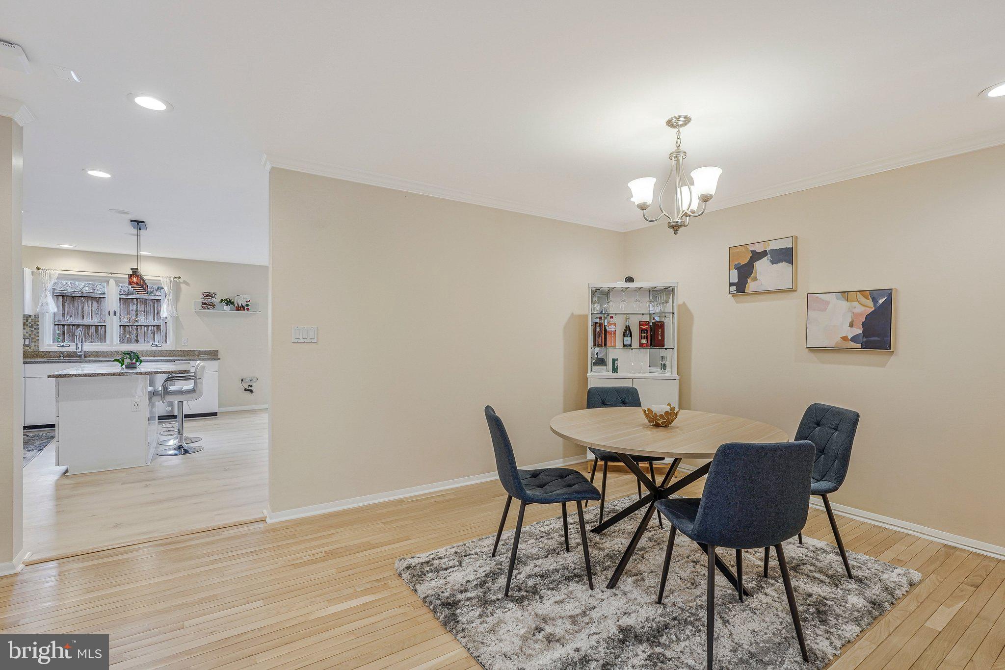 11123 Lakespray Way Reston, VA 20191 - Photo 10 of 47 a view of a dining room with furniture and wooden floor