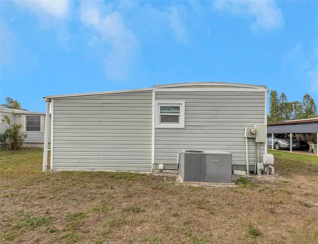 swimming pool view with a garden space