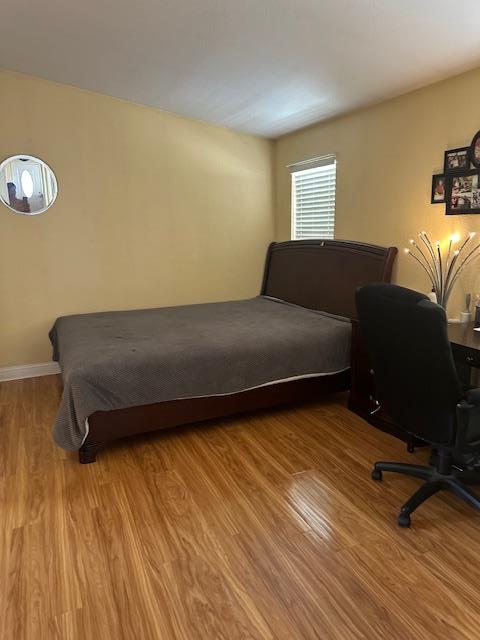 555 Umbarger Road, Unit 108 San Jose, CA 95111 - Photo 11 of 15 a living room with furniture and a wooden floor