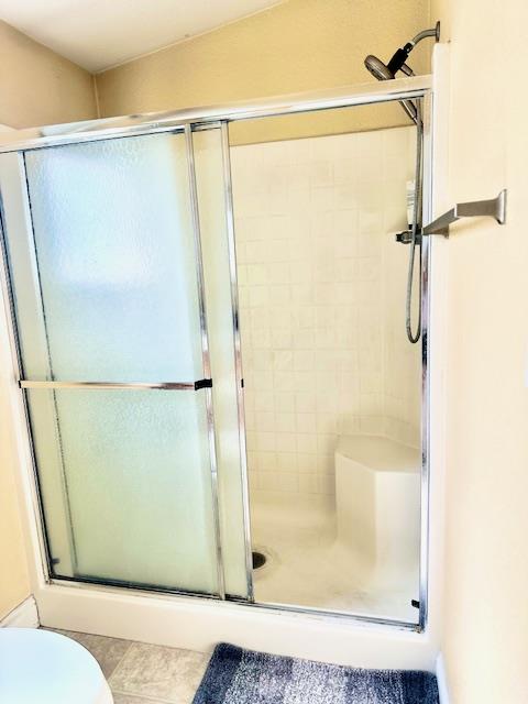 555 Umbarger Road, Unit 108 San Jose, CA 95111 - Photo 9 of 15 a bathroom with a glass shower door