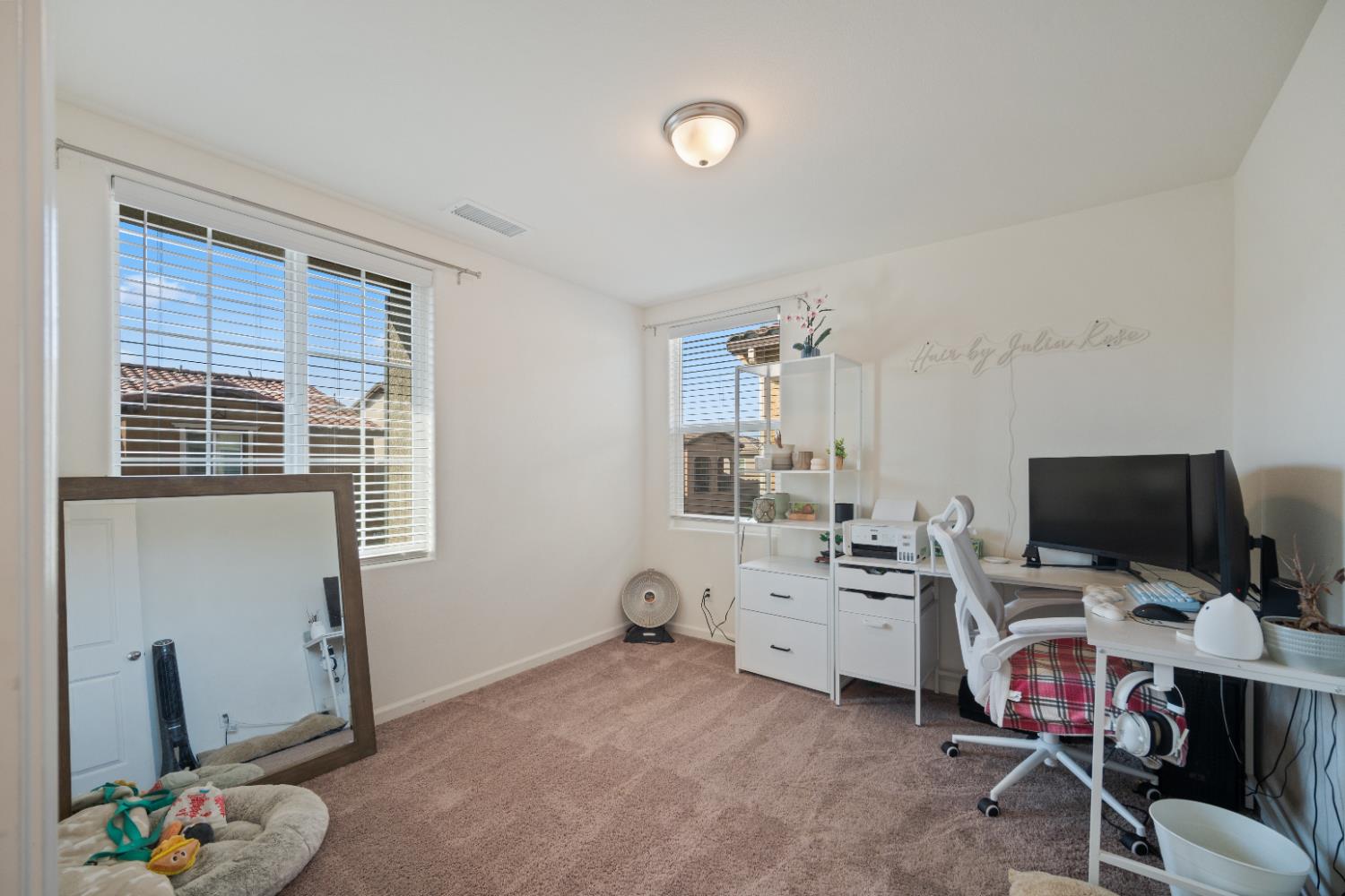 855 Wishon Avenue Madera, CA 93636 - Photo 20 of 29 a view of a workspace with furniture and a window