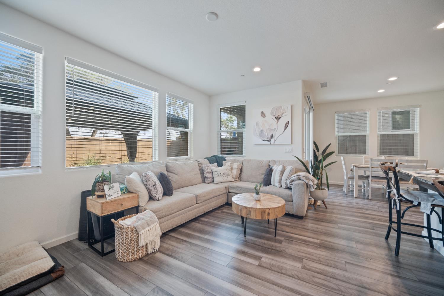 855 Wishon Avenue Madera, CA 93636 - Photo 8 of 29 a living room with furniture and wooden floor