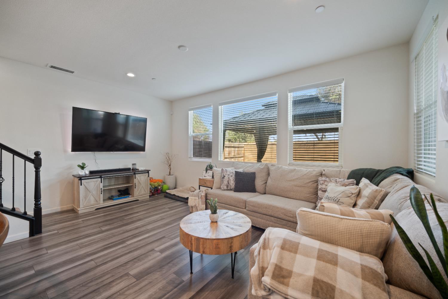 855 Wishon Avenue Madera, CA 93636 - Photo 9 of 29 a living room with furniture and a flat screen tv