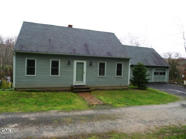67 Sentry Hill Road Roxbury, CT 06783 - Photo 1 of 1 a front view of a house with a garden