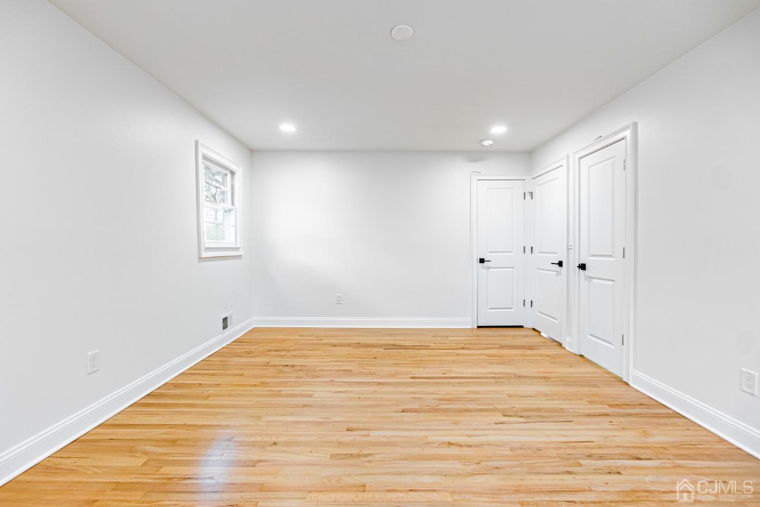 20 Warwick Road Edison, NJ 08820 - Photo 19 of 34 a view of empty room with wooden floor