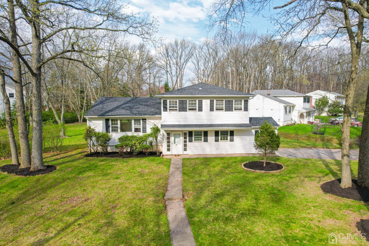 20 Warwick Road Edison, NJ 08820 - Photo 2 of 34 a front view of a house with yard porch and green space