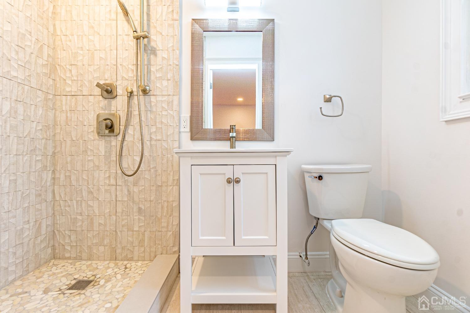 20 Warwick Road Edison, NJ 08820 - Photo 21 of 34 a bathroom with a toilet and a shower