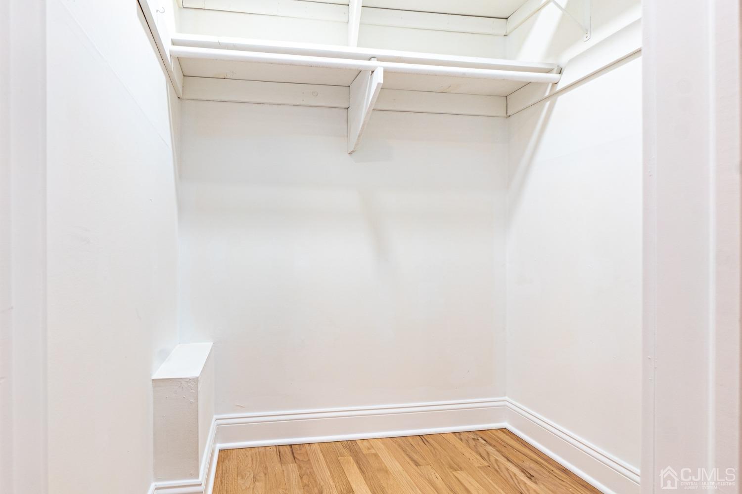 20 Warwick Road Edison, NJ 08820 - Photo 22 of 34 a view of walk in closet with clothes