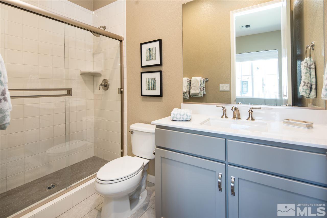 9420 Baldacci Road Reno, NV 89521 - Photo 15 of 25 a bathroom with a sink toilet and shower