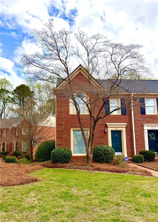 1225 Whitlock Ridge Drive Marietta, GA 30064 - Photo 1 of 1 a front view of a house with a yard
