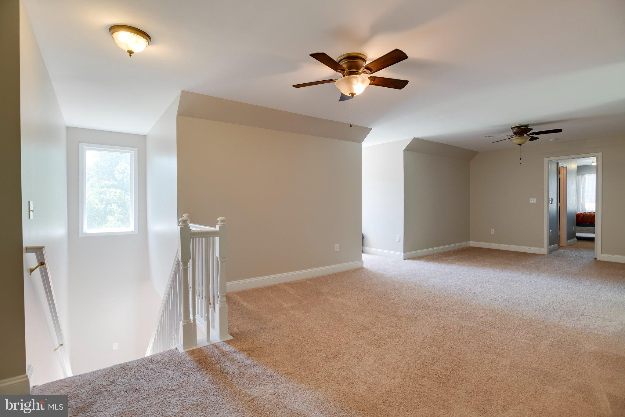 10461 Old Stillhouse Road Boston, VA 22713 - Photo 22 of 63 Spacious, airy landing with natural light.