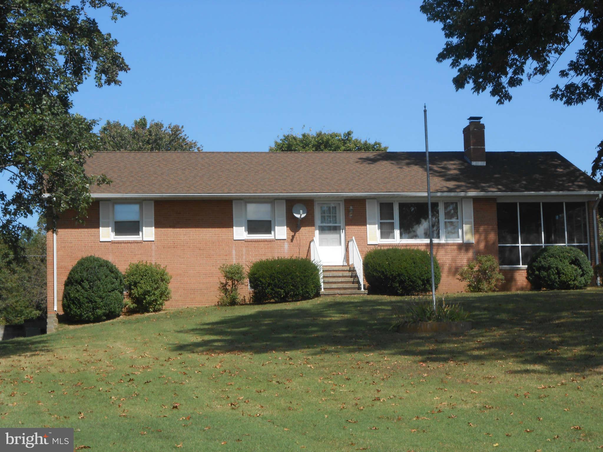 24244 Half Pone Point Road Hollywood, MD 20636 - Photo 19 of 19 a front view of a house with a yard