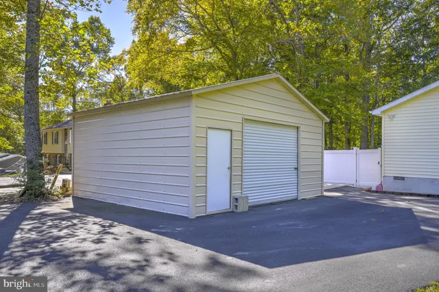 a view of a house with a garage