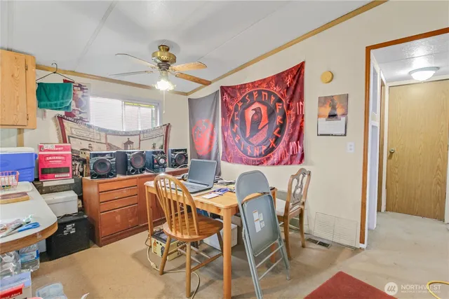 a view of a dining room with furniture