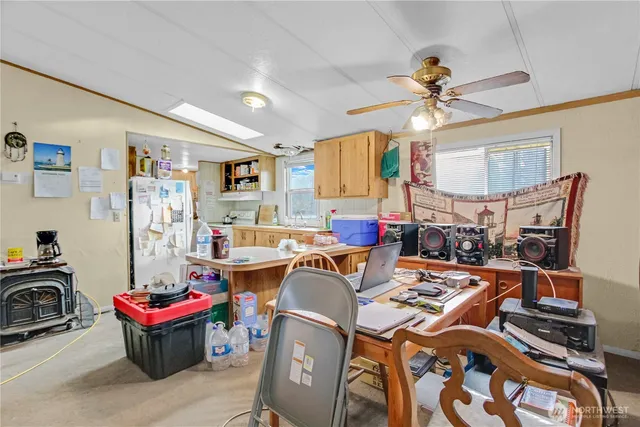 a living room with lots of furniture and a chandelier