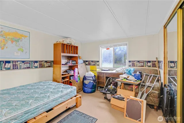 a room with furniture and a flat screen tv