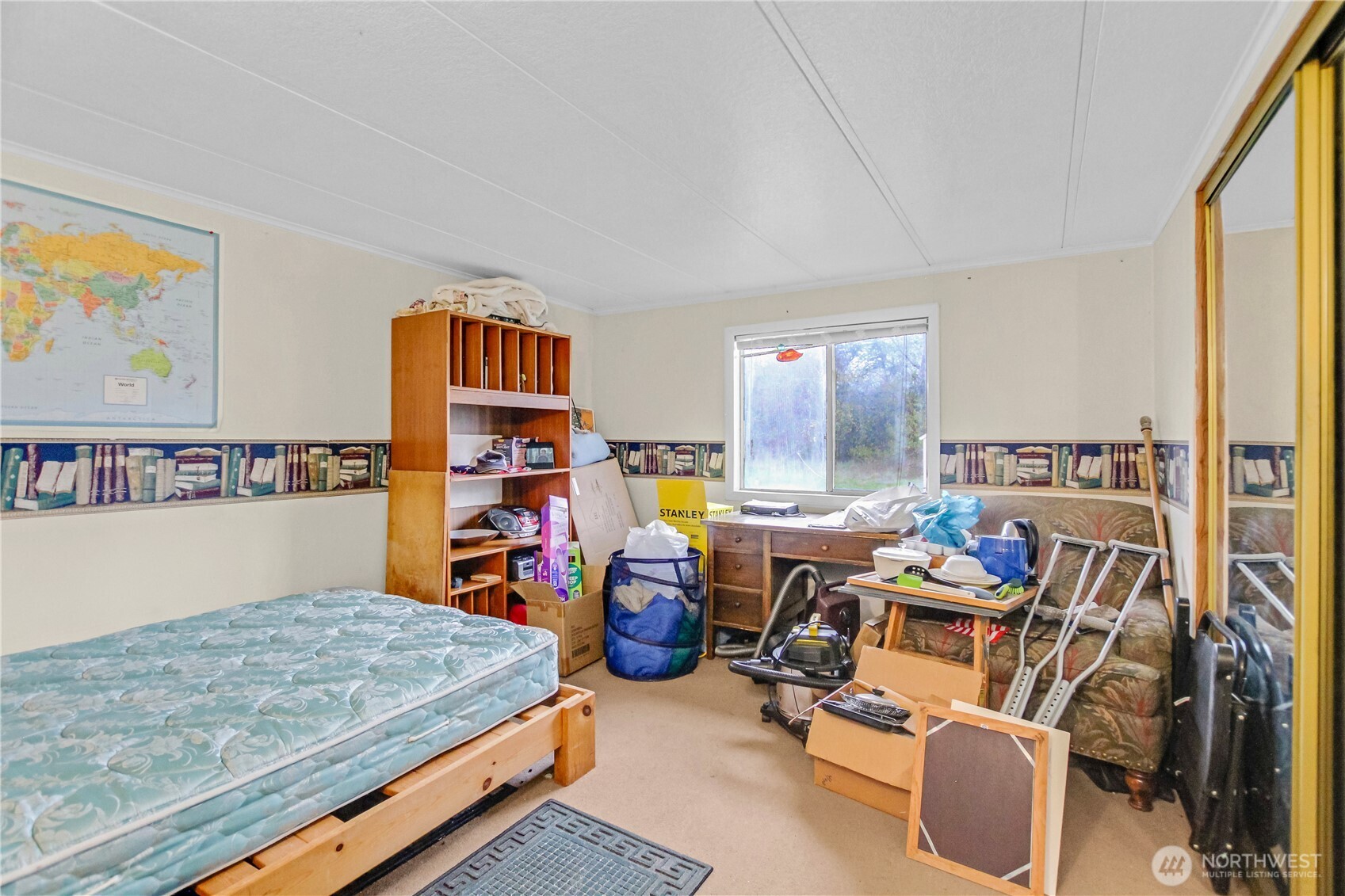805 Elochoman Valley Road Cathlamet, WA 98612 - Photo 25 of 28 a room with furniture and a flat screen tv