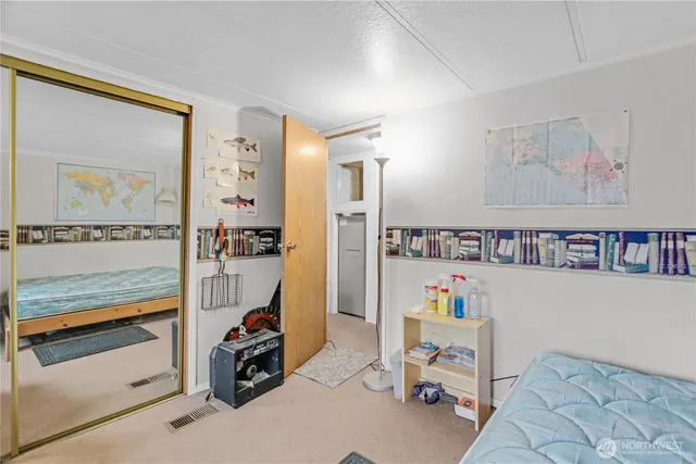 a room with furniture and a view of living room