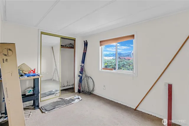 a view of a room with toys and a window