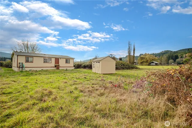 a house view with a garden space