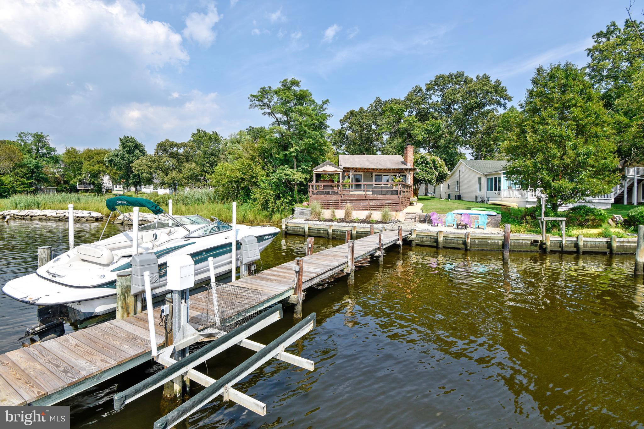 396 Riverside Drive Pasadena, MD 21122 - Photo 22 of 30 New pier decking, jet ski and boat lift