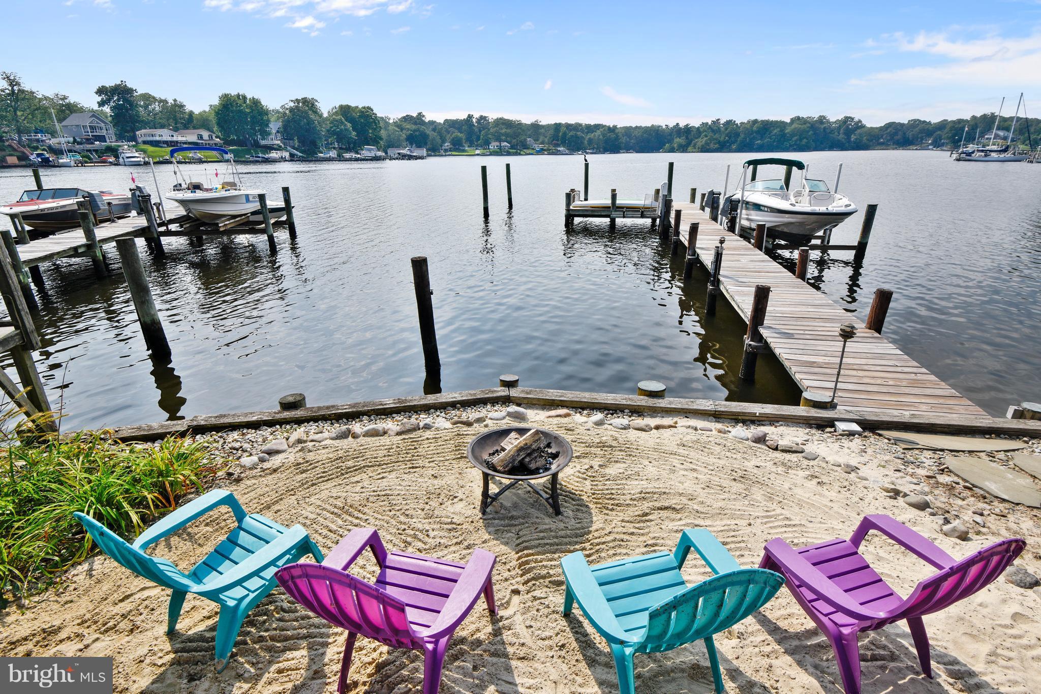 396 Riverside Drive Pasadena, MD 21122 - Photo 23 of 30 Enjoy the view around the fire pit
