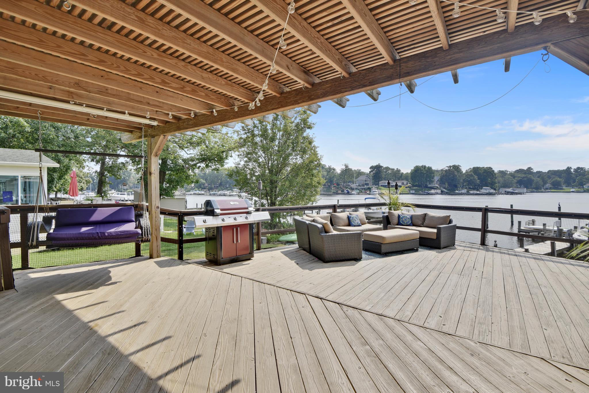 396 Riverside Drive Pasadena, MD 21122 - Photo 24 of 30 Escape from the sun under the pergola