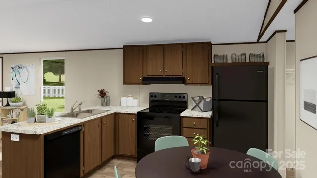 a kitchen with a sink refrigerator and cabinets