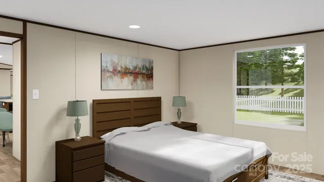 a bedroom with a bed and a painting on the wall