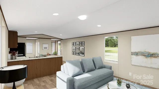 a living room with a couch and a large window