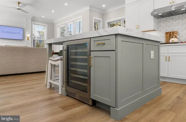a view of cabinets and wooden floor